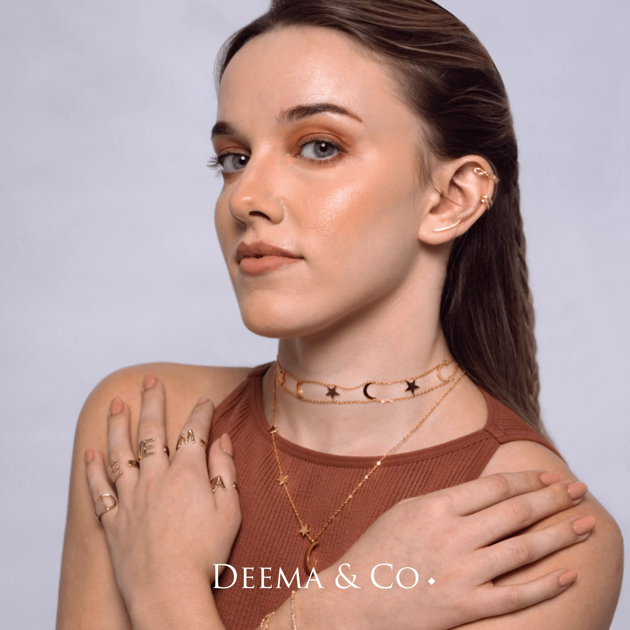 emma modelling for deema & co - wearing regalia sultana choker and long necklaces, initial stack rings, 18K PVD Gold Plated, Tarnish Free Jewellery