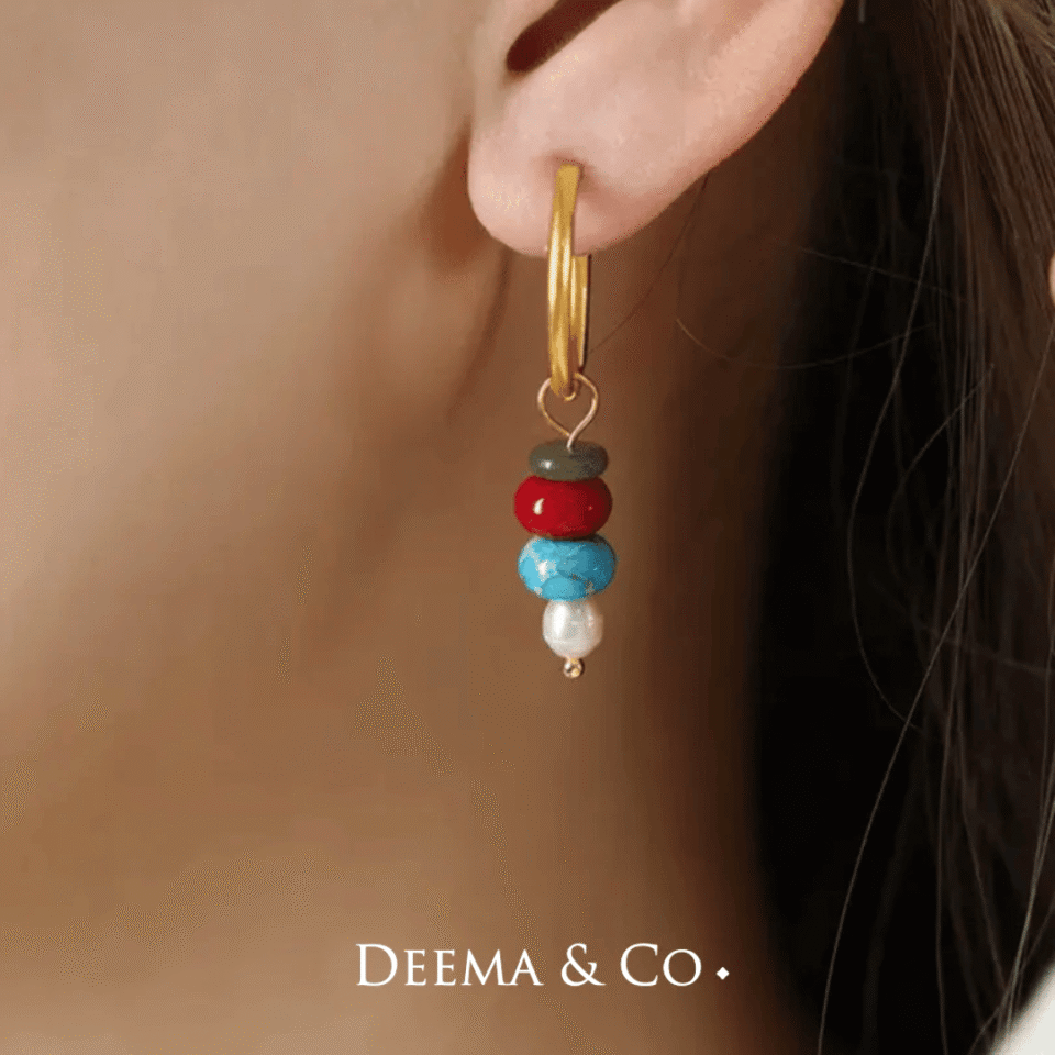 Model wearing water safe tarnish-free hypoallergenic everyday fun bold statement huggies